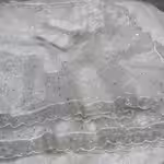 White net saree for women with heavy beadwork 