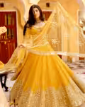 Stylish haldi yellow lehenga with mirror work