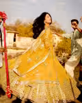 Stylish haldi yellow lehenga with mirror work