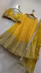 Stylish haldi yellow lehenga with mirror work