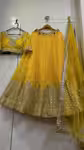 Stylish haldi yellow lehenga with mirror work