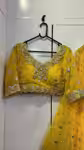 Stylish haldi yellow lehenga with mirror work