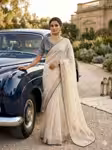 Off white wedding saree with contrast navy blue blouse