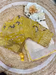 Off white wedding saree with contrast green blouse