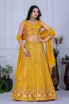 Yellow lehenga for haldi with embroidery and sequins