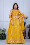 Yellow lehenga for haldi with embroidery and sequins