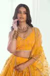Designer yellow lehenga for haldi pre-wedding function