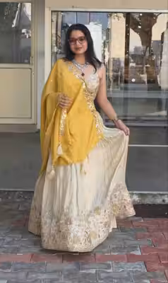 Yellow lehenga for haldi bridal style with Chinon choli